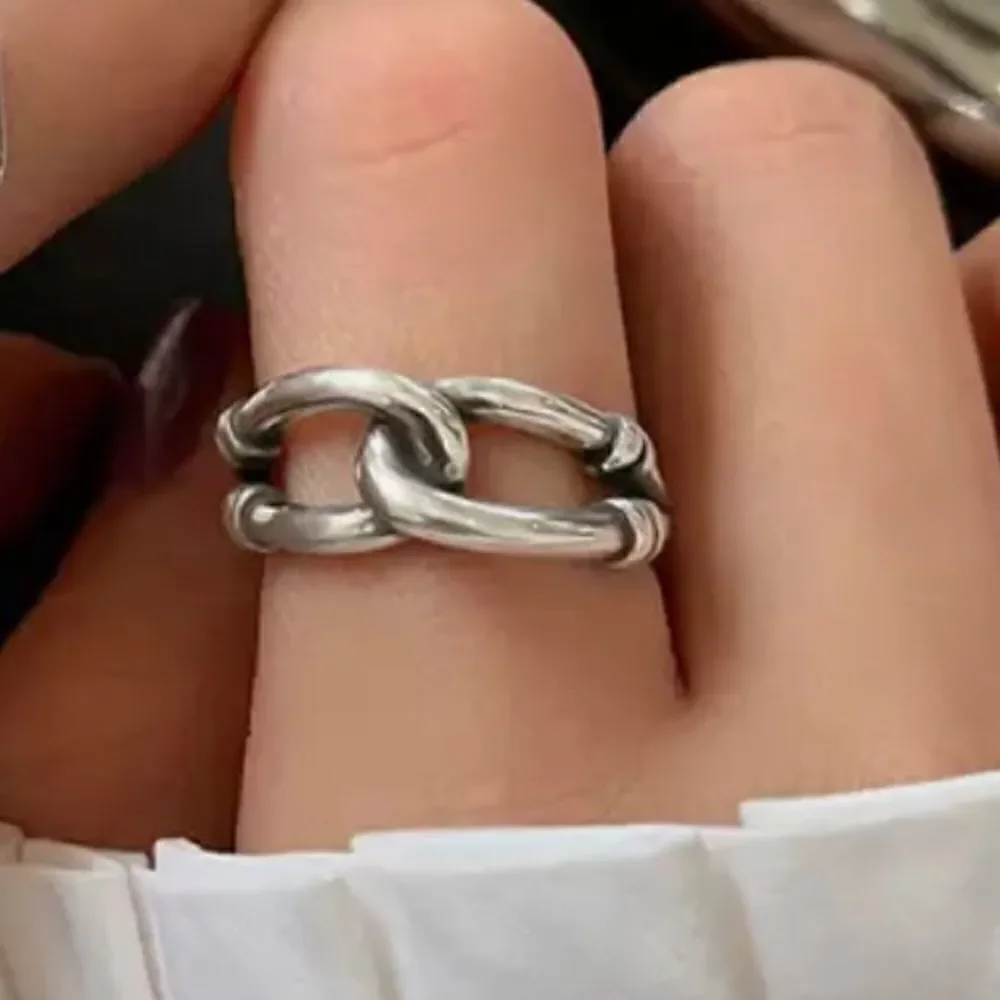 The Tie Me In Knots Ring, adjustable in 925 silver